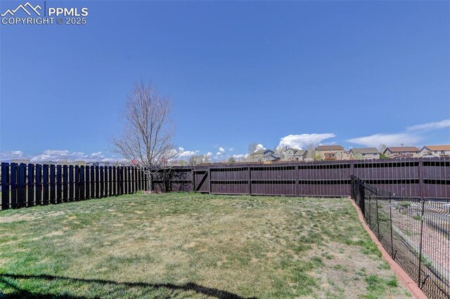 7884 Gladwater Rd, Peyton, CO 80831 - view of yard with a fenced backyard