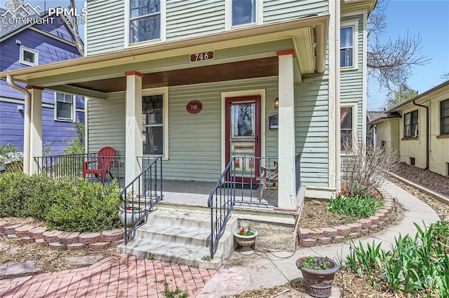 entrance to property with covered porch