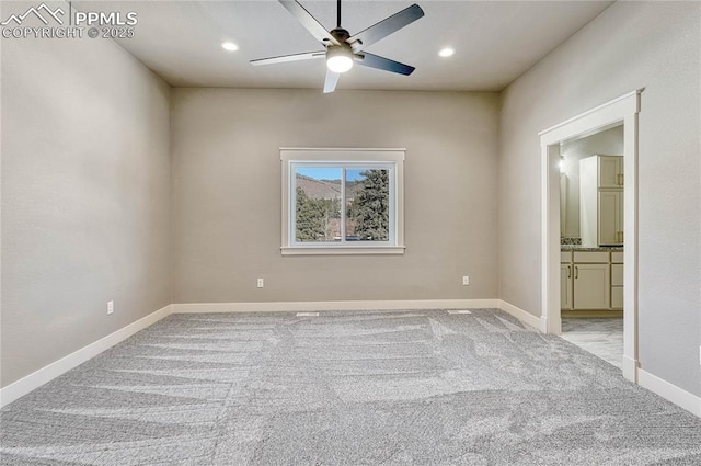 unfurnished bedroom with carpet flooring, baseboards, and recessed lighting