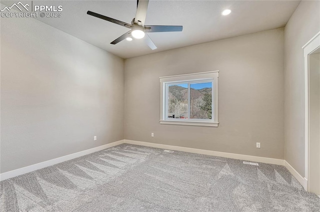 carpeted spare room with ceiling fan, baseboards, visible vents, and recessed lighting