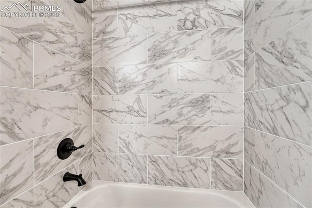 bathroom with shower / bathtub combination