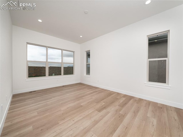 3188 Virga Loop, Colorado Springs, CO 80904 - unfurnished room with light wood-style flooring, baseboards, and recessed lighting