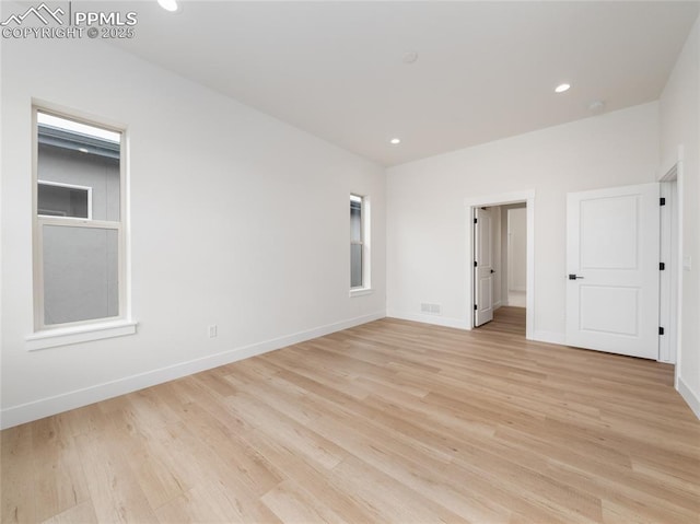 3188 Virga Loop, Colorado Springs, CO 80904 - unfurnished bedroom with light wood finished floors, baseboards, visible vents, and recessed lighting