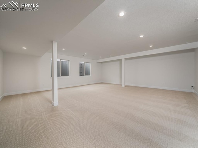 3188 Virga Loop, Colorado Springs, CO 80904 - finished basement with light colored carpet, baseboards, and recessed lighting