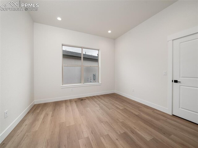 3188 Virga Loop, Colorado Springs, CO 80904 - spare room featuring baseboards, light wood-style flooring, and recessed lighting