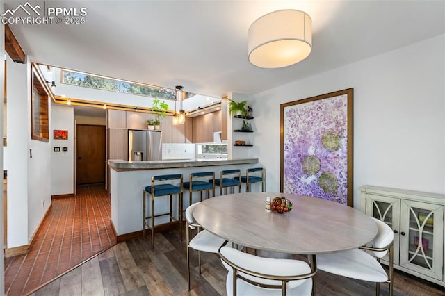 dining area featuring wood finished floors