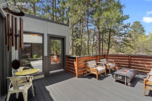 deck with a fire pit