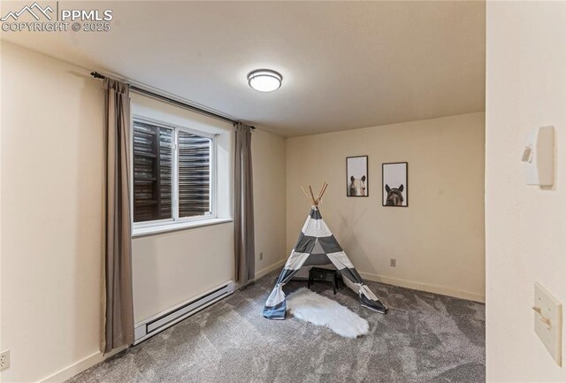 3543 Blue Mesa Dr, Divide, CO 80814 - recreation room featuring baseboard heating, carpet, and baseboards