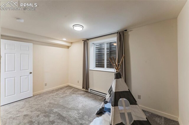 3543 Blue Mesa Dr, Divide, CO 80814 - game room featuring carpet floors, baseboard heating, and baseboards
