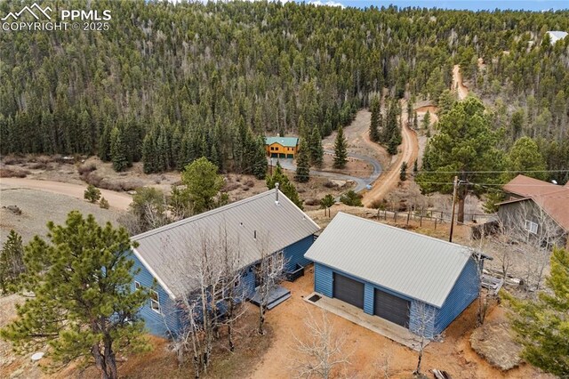 3543 Blue Mesa Dr, Divide, CO 80814 - aerial view of property and surrounding area featuring a forest