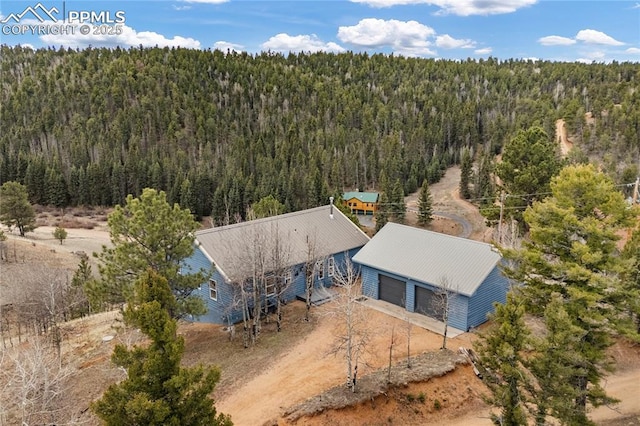 3543 Blue Mesa Dr, Divide, CO 80814 - aerial view of property and surrounding area with a heavily wooded area