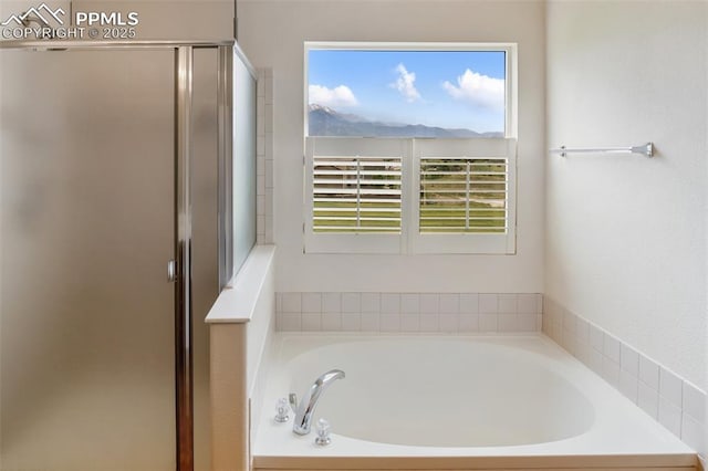 2121 Gilpin Ave, Colorado Springs, CO 80910 - bathroom featuring a shower stall and a bath