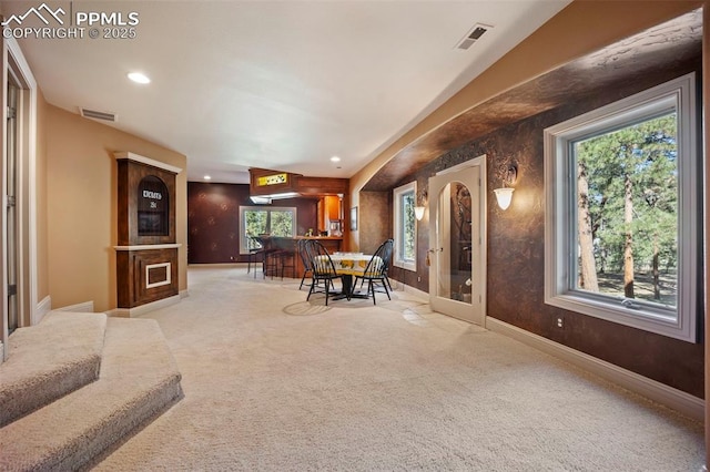 carpeted dining area with baseboards, recessed lighting, and visible vents