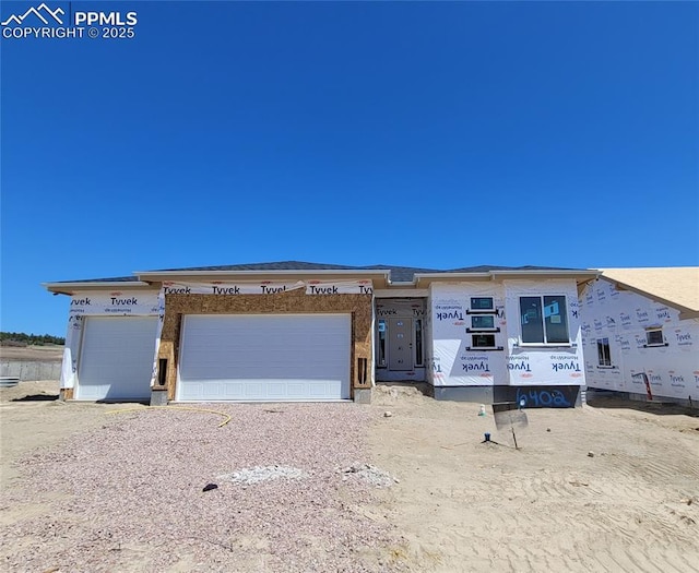 6402 Loaderman Dr, Colorado Springs, CO 80924 - view of front of property with an attached garage