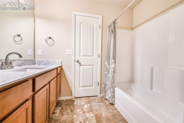 7652 Red Fir Pt, Colorado Springs, CO 80908 - full bathroom with baseboards, shower / bathtub combination with curtain, and vanity