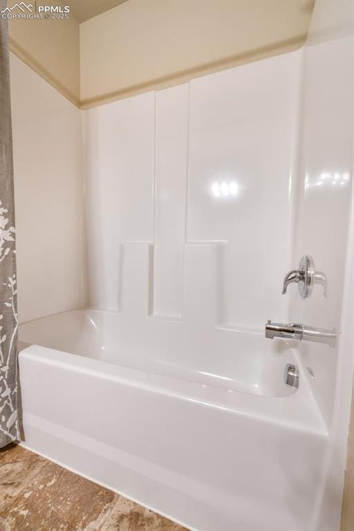 full bath with shower / bathtub combination with curtain