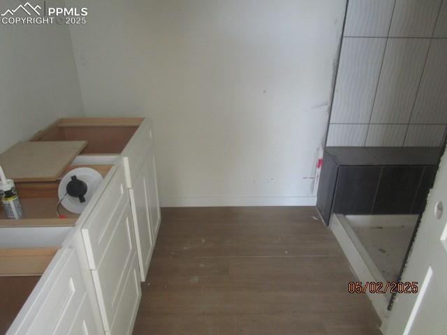 1019 Race St, Colorado Springs, CO 80904 - interior space with baseboards and wood finished floors