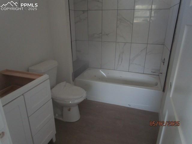1019 Race St, Colorado Springs, CO 80904 - full bath with toilet, shower / washtub combination, and vanity