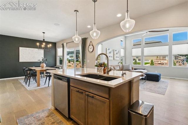 10323 Elevated Ln, Colorado Springs, CO 80924 - kitchen featuring dishwasher, a wealth of natural light, open floor plan, and a sink