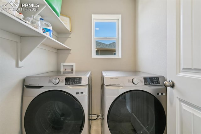 10323 Elevated Ln, Colorado Springs, CO 80924 - clothes washing area with washing machine and dryer and laundry area