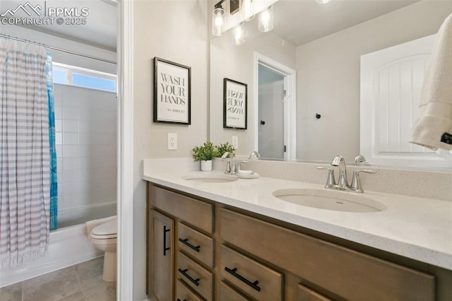 10323 Elevated Ln, Colorado Springs, CO 80924 - bathroom with toilet, shower / tub combo with curtain, double vanity, and a sink