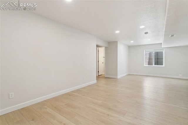 10323 Elevated Ln, Colorado Springs, CO 80924 - empty room with baseboards, recessed lighting, and light wood-type flooring