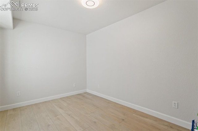 10323 Elevated Ln, Colorado Springs, CO 80924 - empty room featuring baseboards and wood finished floors