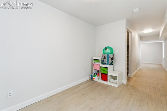 10323 Elevated Ln, Colorado Springs, CO 80924 - recreation room featuring light wood finished floors and baseboards