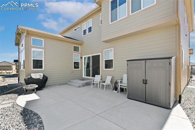 10323 Elevated Ln, Colorado Springs, CO 80924 - rear view of property featuring a patio area