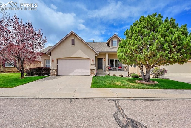 view of front of house featuring a front yard, a garage, concrete driveway, stone siding, and stucco siding