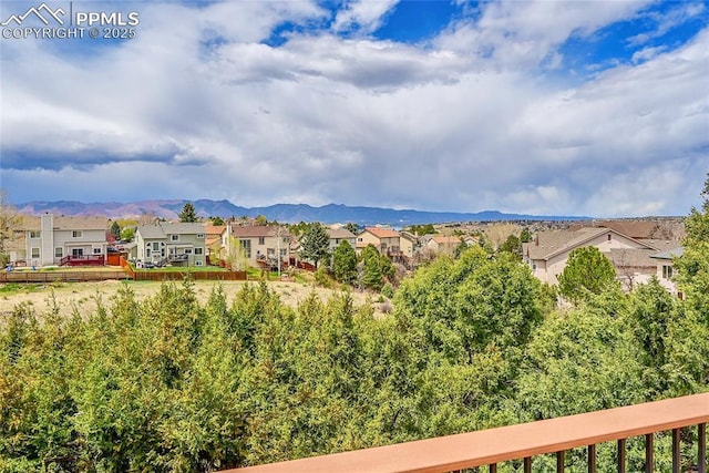 property view of mountains featuring a residential view