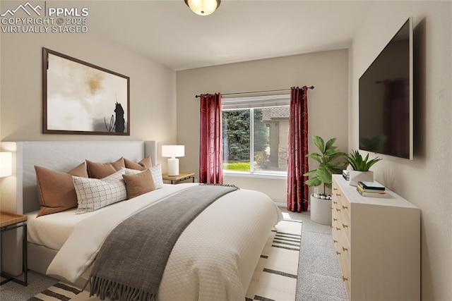 bedroom featuring light carpet