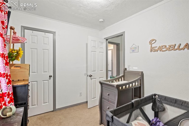 2246 Bison Dr, Colorado Springs, CO 80911 - bedroom with light colored carpet, baseboards, and crown molding
