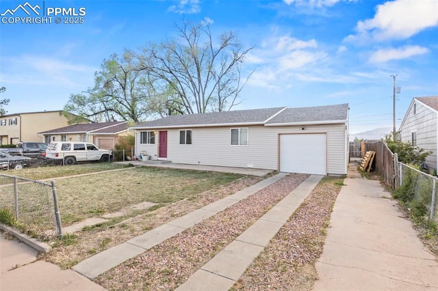 2246 Bison Dr, Colorado Springs, CO 80911 - single story home with concrete driveway, fence, a front yard, and a garage