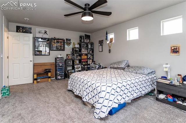 carpeted bedroom with a ceiling fan