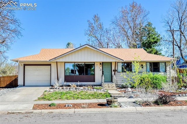 ranch-style home with an attached garage, a shingled roof, fence, and concrete driveway