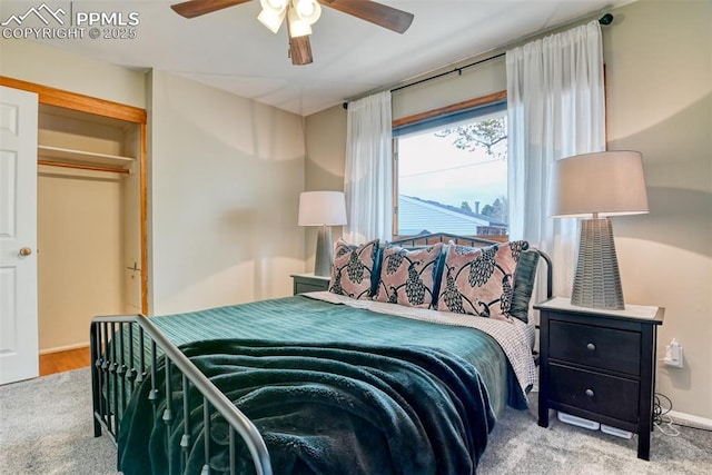 bedroom featuring carpet flooring, a ceiling fan, and baseboards