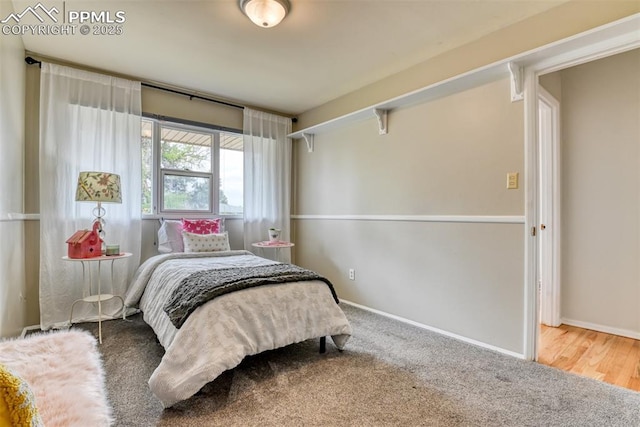 bedroom featuring baseboards