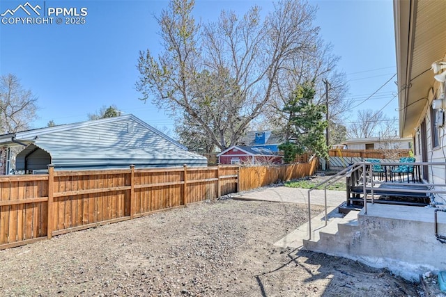 view of yard with a fenced backyard