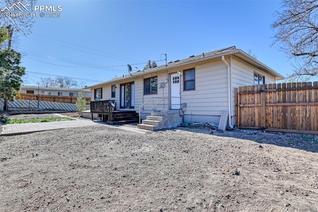 view of front of property with fence