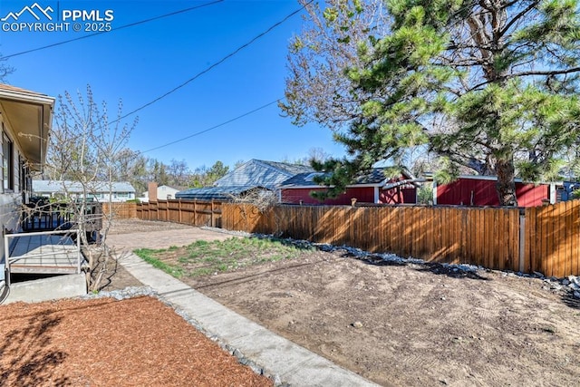 view of yard featuring a fenced backyard