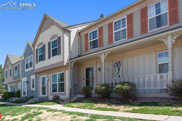 3319 Queen Anne Way, Colorado Springs, CO 80917 - view of property with board and batten siding