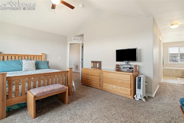 carpeted bedroom with connected bathroom, baseboards, visible vents, and high vaulted ceiling