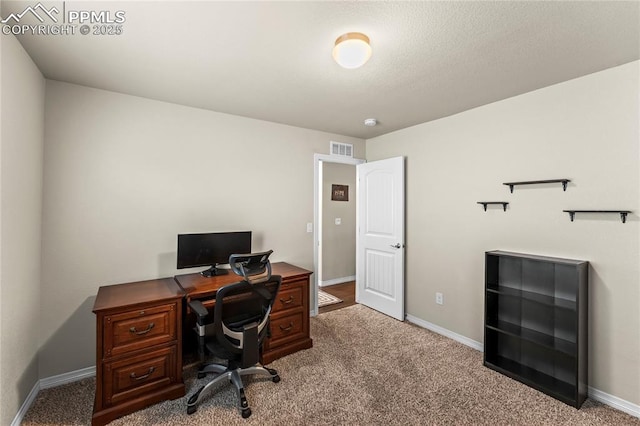 6647 Weiser Dr, Colorado Springs, CO 80925 - carpeted home office featuring visible vents and baseboards