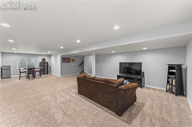 6647 Weiser Dr, Colorado Springs, CO 80925 - living area featuring stairway, light carpet, and recessed lighting