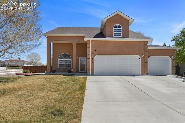 view of front facade featuring a garage, stucco siding, concrete driveway, and a front yard