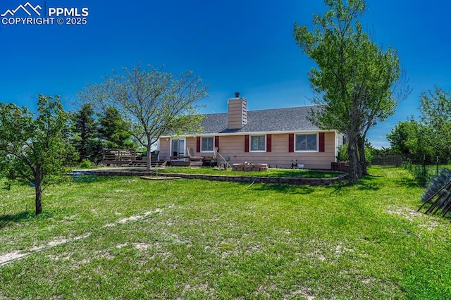 16440 Eastonville Rd, Elbert, CO 80106 - rear view of house with a chimney, a patio, and roof with shingles