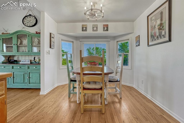 16440 Eastonville Rd, Elbert, CO 80106 - dining room with a chandelier and light wood finished floors