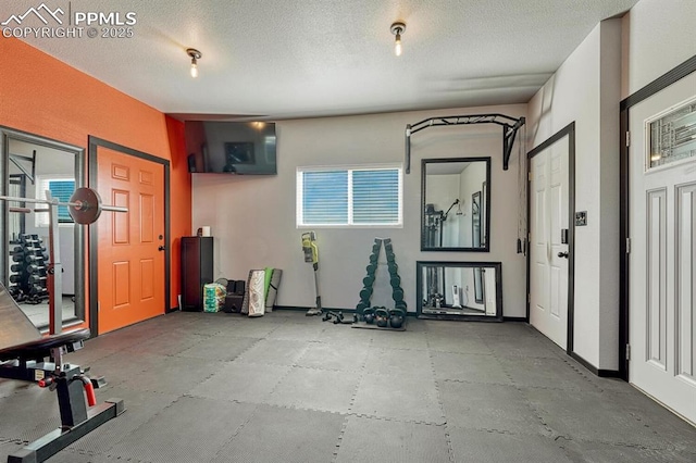16440 Eastonville Rd, Elbert, CO 80106 - exercise area with a textured ceiling