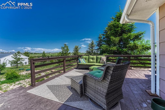 16440 Eastonville Rd, Elbert, CO 80106 - wooden deck featuring an outdoor living space
